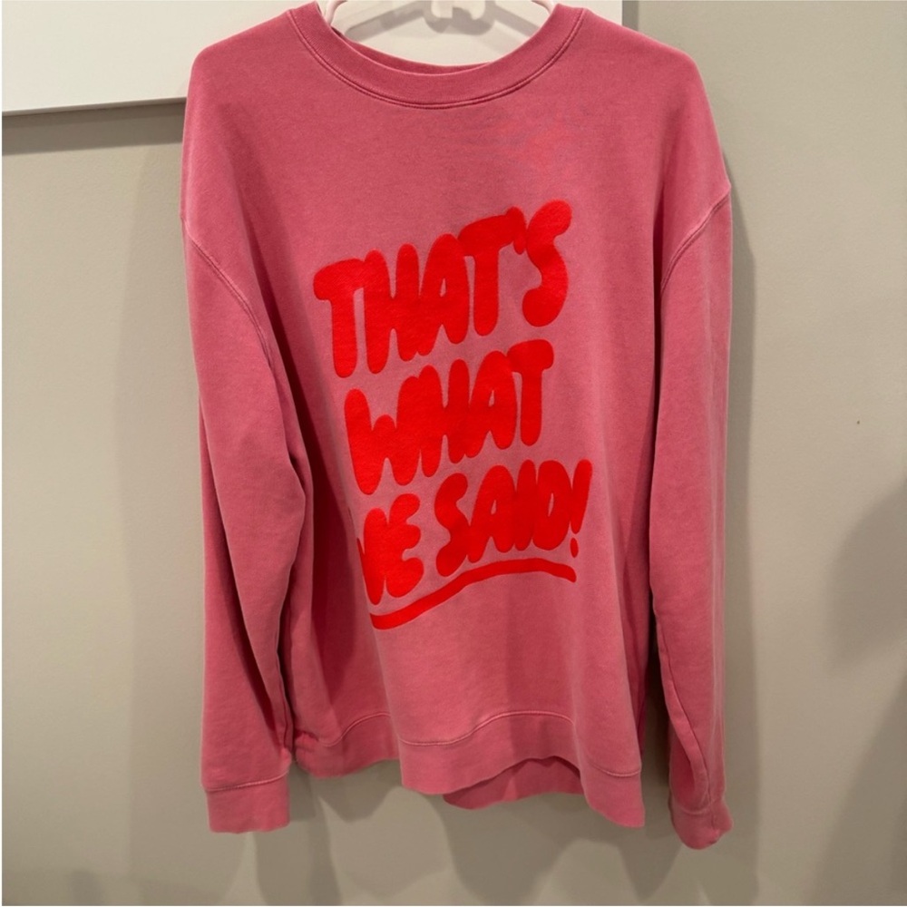 Trendy Pink Sweatshirt with Red Graphic
